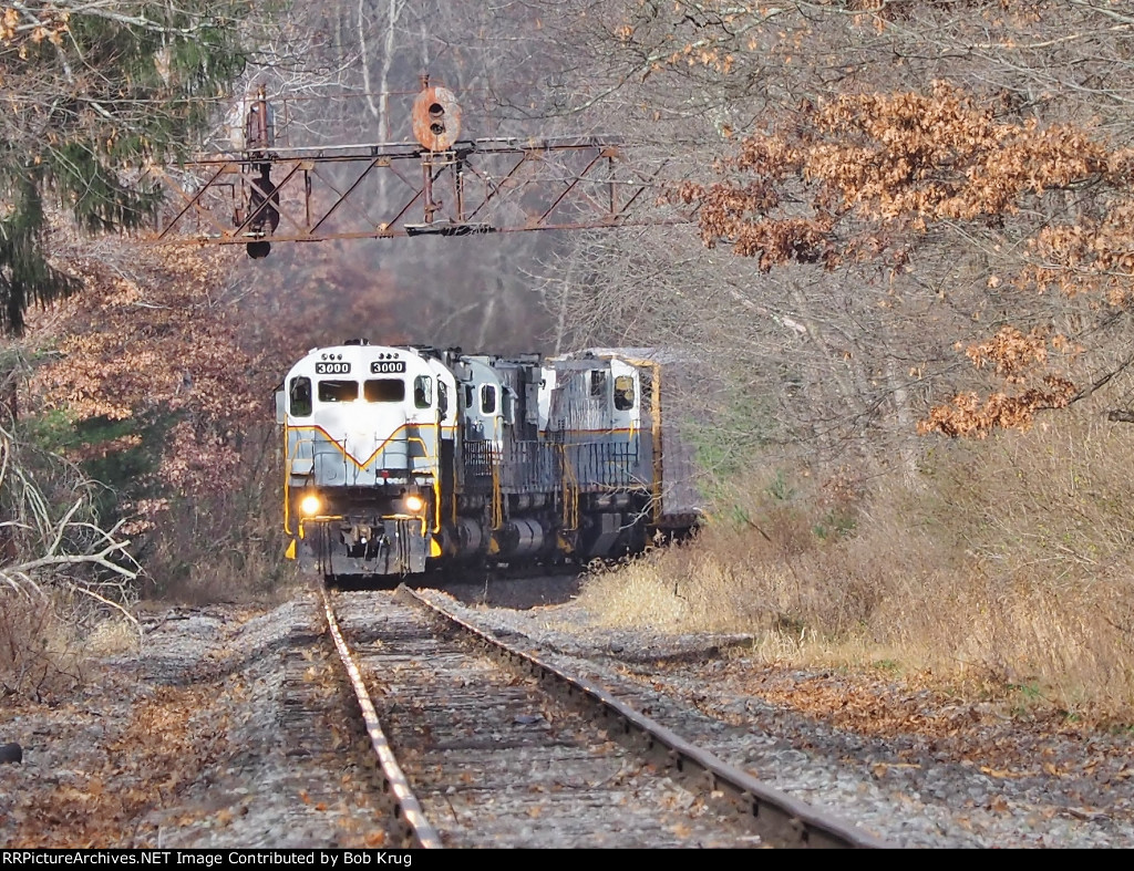 DL 3000 leads freight train PO-74 eastbound at Elmhurst